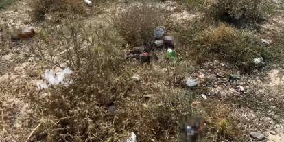 Yüksekova’da mezarlık yanına bırakılan alkol şişeleri tepki topladı